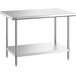 A stainless steel Regency work table with an undershelf.