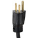 A black power cord with two gold electrical plugs.