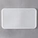 A white plastic lid for a Carlisle rectangular food storage container.