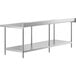 A Regency stainless steel work table with undershelf and backsplash.
