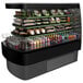 A black Structural Concepts Oasis air curtain display case with food and drinks.