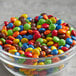A bowl of Chocolate Rainbow Mini Gems.