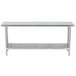 A silver stainless steel rectangular table with a shelf.