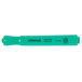 A Universal fluorescent green chisel tip highlighter pen.