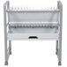 A white metal rack with many holes.
