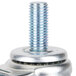 A close-up of a metal stem with a threaded bolt.