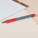 Universal UNV39722 Red Medium Point 0.7mm Retractable Rollerball Gel Pen - 12/Pack Main Thumbnail 8