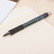 Universal UNV39720 Black Medium Point 0.7mm Retractable Rollerball Gel Pen - 12/Pack Main Thumbnail 8