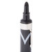 A close up of a black Avery Marks-A-Lot permanent marker with a silver tip and a black cap.