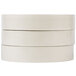 A stack of three rolls of white Universal general purpose masking tape.