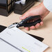 Universal UNV74321 8 Sheet Black Handheld 1 Hole Punch with Rubber Grip - 1/4" Holes Main Thumbnail 10