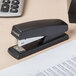 Universal UNV43119 20 Sheet Black Half Strip Desktop Stapler Main Thumbnail 1