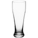 An Acopa clear Pilsner glass on a white background.