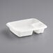 An EcoChoice white compostable bagasse tray with two compartments.