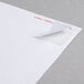 A white envelope with a white Universal 1" x 2 5/8" label on it.