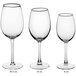 Three Acopa Select Blanc wine glasses on a white background.