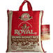 A red, white, and gold bag of Royal Basmati Brown Rice with a label.