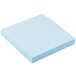 A light blue square Universal pastel sticky note.