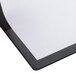 A close up of a black Universal Deluxe Non-Stick View Binder with white paper inside.