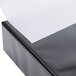 A black Universal Deluxe Non-Stick View Binder box with a white sheet of paper on top.