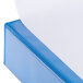A close-up of a Universal light blue binder.