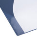 A blue Universal Royal Blue non-stick binder with white paper inside.