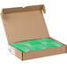 A box of green Avery shipping tags.