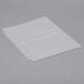 A white rectangular Avery sheet protector with holes.