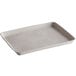 A white rectangular tray with a textured edge.