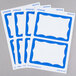 A pack of Universal white name badges with blue borders.