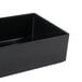 A black rectangular Cal-Mil melamine box on a counter.