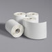 A group of rolls of white thermal paper with the Avery 4157 box in the background.