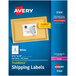 A package of Avery white rectangular shipping labels with a blue and white box.