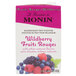 Monin Wildberry Fruit Smoothie Mix carton on white background.