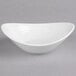 A white Reserve by Libbey oval bowl on a gray surface.