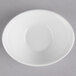 A case of 36 white porcelain oval bowls with a white background.