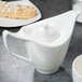 A white Reserve by Libbey Royal Rideau tea pot on a table.
