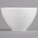 A white bowl with a wavy design on it.