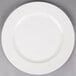 A white Reserve by Libbey round porcelain plate with a white rim.