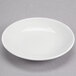 A white Reserve by Libbey Royal Rideau porcelain dipping dish.
