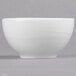 A white Reserve by Libbey Royal Rideau bowl with a wavy design on it.