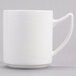 A close up of a white Reserve by Libbey Royal Rideau Stacking Mug with a handle.