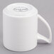 A white Royal Rideau porcelain mug with a handle.