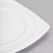 A close-up of a Reserve by Libbey white porcelain plate with a white rim.