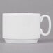 A white 10 Strawberry Street bone china coffee cup with a handle on a saucer.