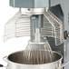 A stainless steel Avantco mixer bowl guard on a mixer.