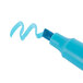 A close-up of a Universal blue chisel tip highlighter pen.