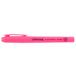 A Universal pink pen with a pocket clip and black text.