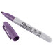 A close-up of a Sharpie purple marker with a white cap.