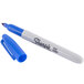 A close-up of a blue Sharpie marker with a blue cap.